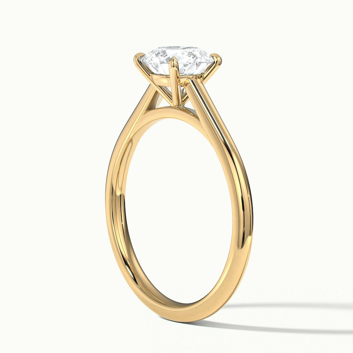 Nia 2 Carat Round Cut Solitaire Moissanite Engagement Ring in 10k Yellow Gold