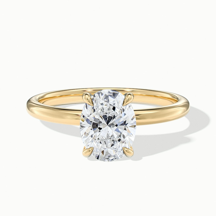 Jade 1.5 Carat Oval Cut Solitaire Moissanite Diamond Ring in 10k Yellow Gold