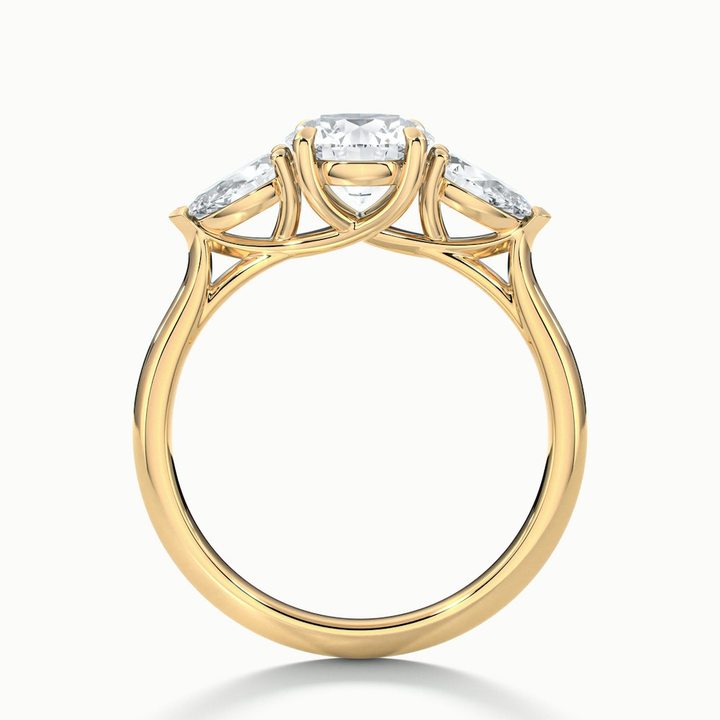 Amaya 1 Carat Round 3 Stone Moissanite Diamond Ring With Pear Side Stone in 14k Yellow Gold